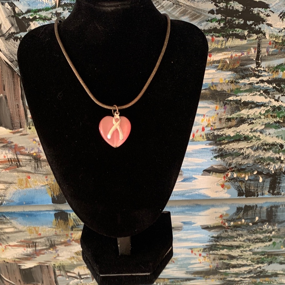 Pink Heart Pendant With Silver Tone Crossed Ribbion Symbol Necklace